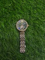F🔥ssil dual tone chain watch with a green dial for women - Image 2