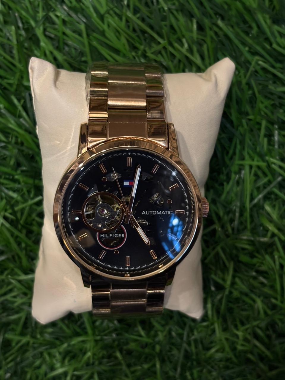 WhatsApp Image 2025-10-10 at 9.34.49 AM (2) T🔥mmy Hil🔥iger Black Dial Automatic chain watch for men - Image 1