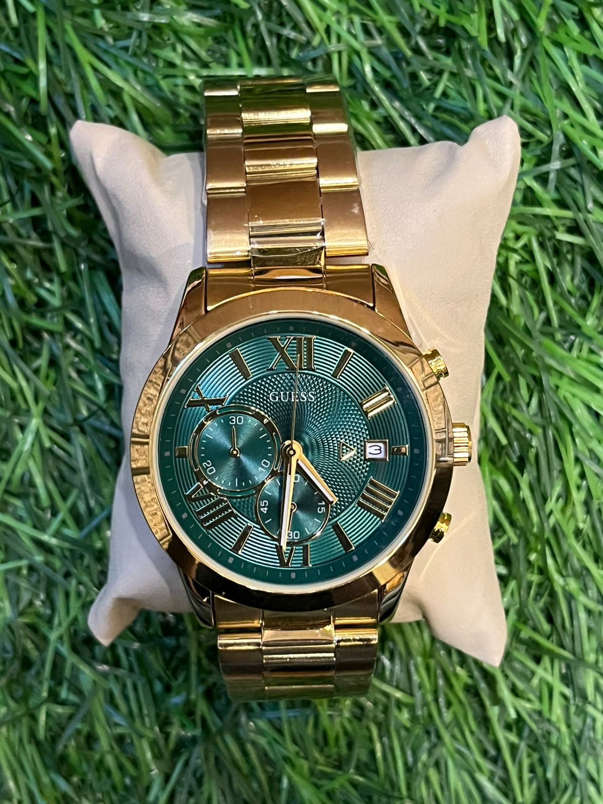 WhatsApp Image 2026-03-02 at 16.05.01 (1) G🔥ess gold chain green roman dial watch for men's - Image 1